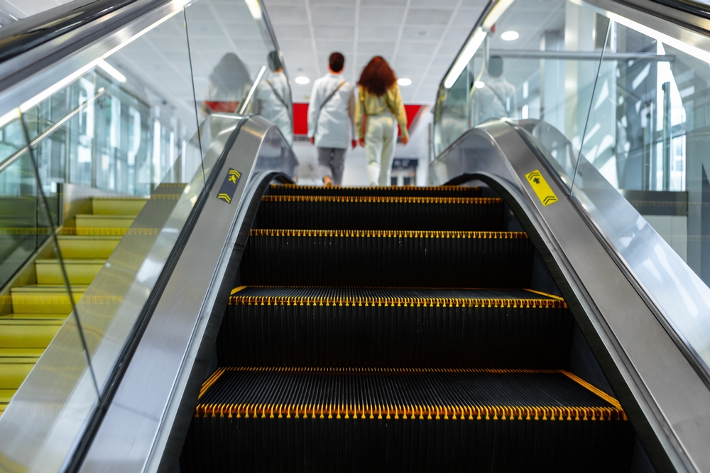 Escalator posing a potential fall risk 