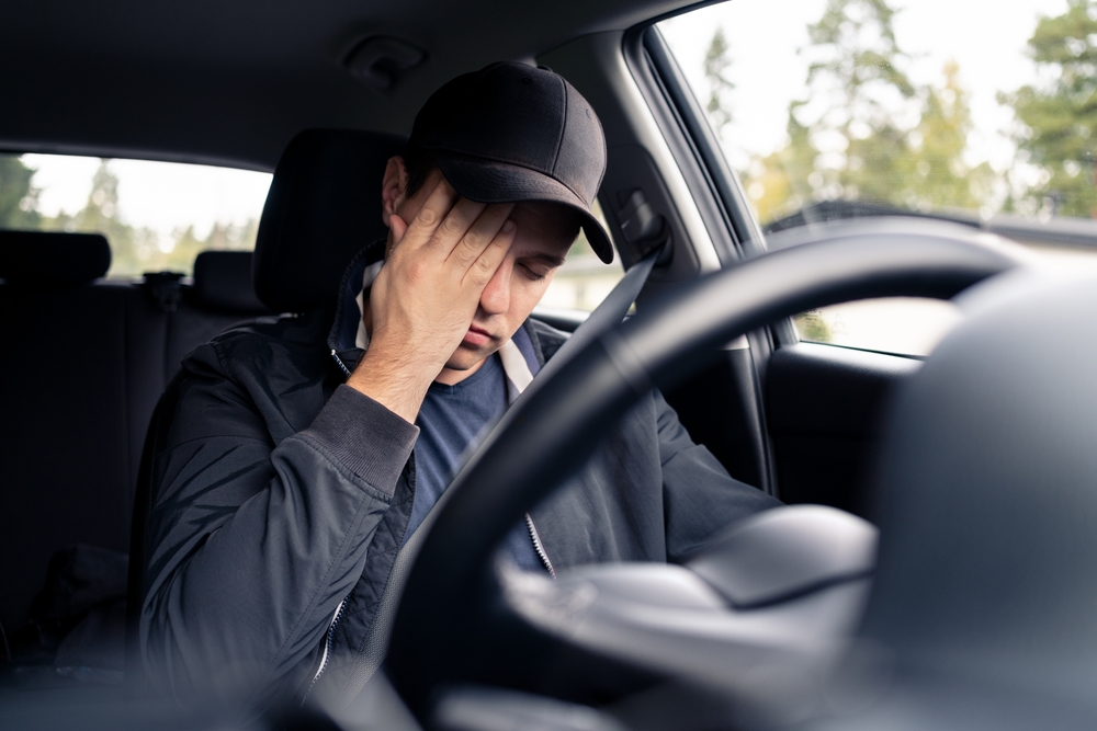 Impaired driver behind wheel of car